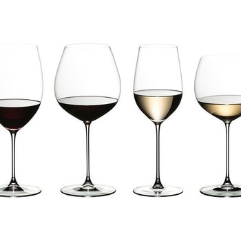 Four wine glasses stand side-by-side. On the left are two glasses filled with red wine. On the right are two glasses filled with white wine. Shop burgundywine.com for exceptional, small-production Burgundy wine.