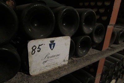 A rack of aged bottles of wine from Beaune, Burgundy, France. 